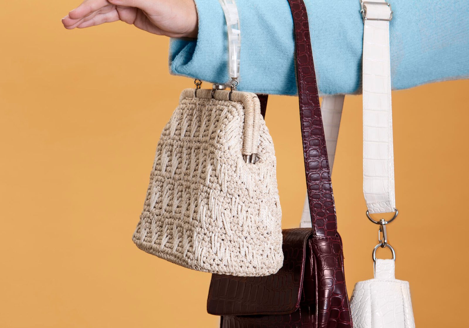 must-have-crochet-bag Person showing 3 types of Bag